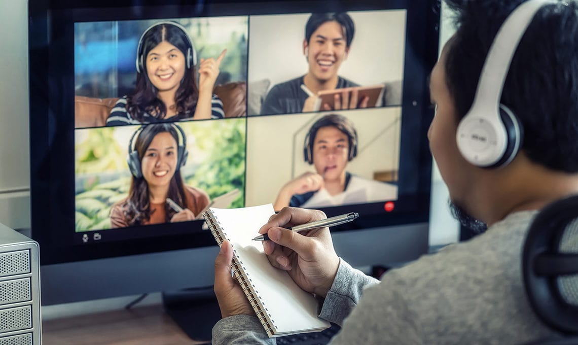 A man learning online via video